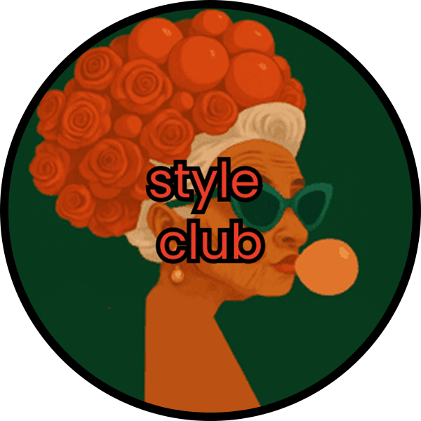 Stylish woman with a vibrant afro and bubblegum, wearing sunglasses.