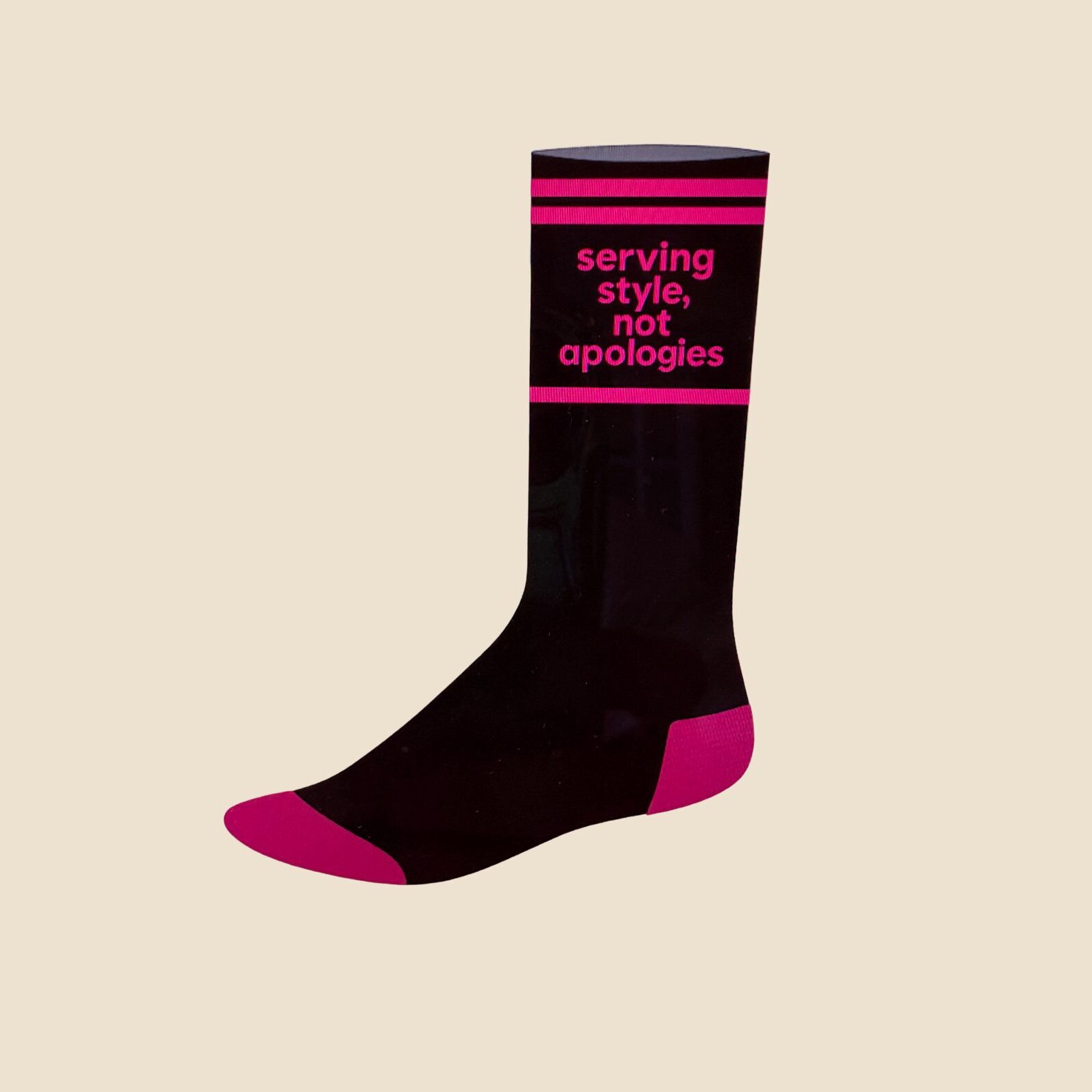 Black sock with pink accents and motivational text design.